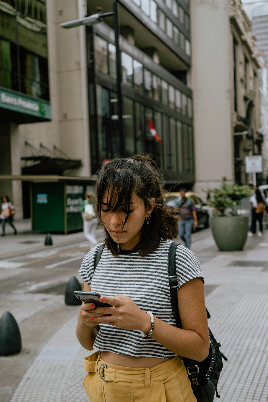 woman reading message on phone